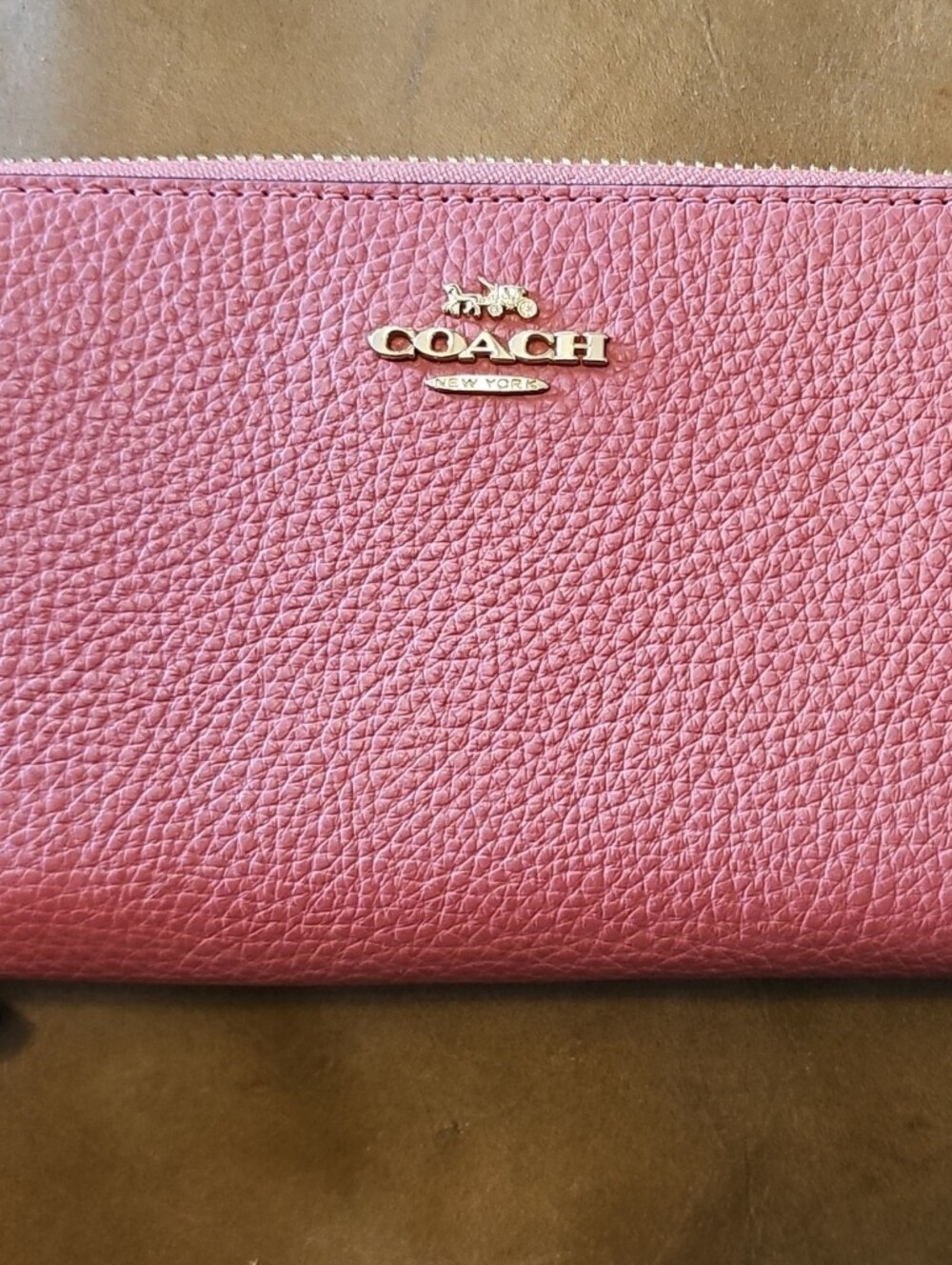 COACH Pink Pebbled Leather Zip Around Wallet with Gold Logo